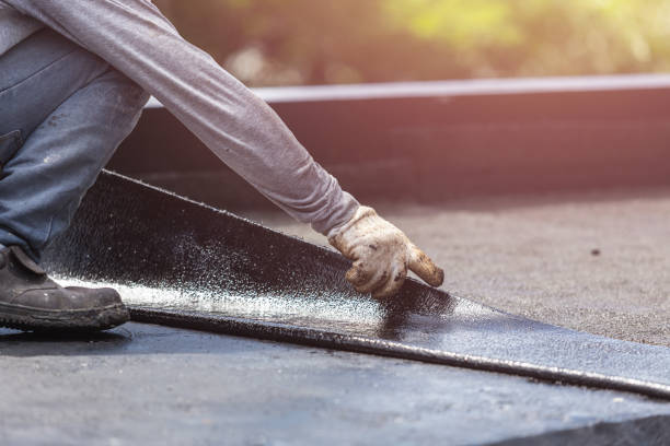 Professional Emergency Waterproofing technician working in Arlington, IN